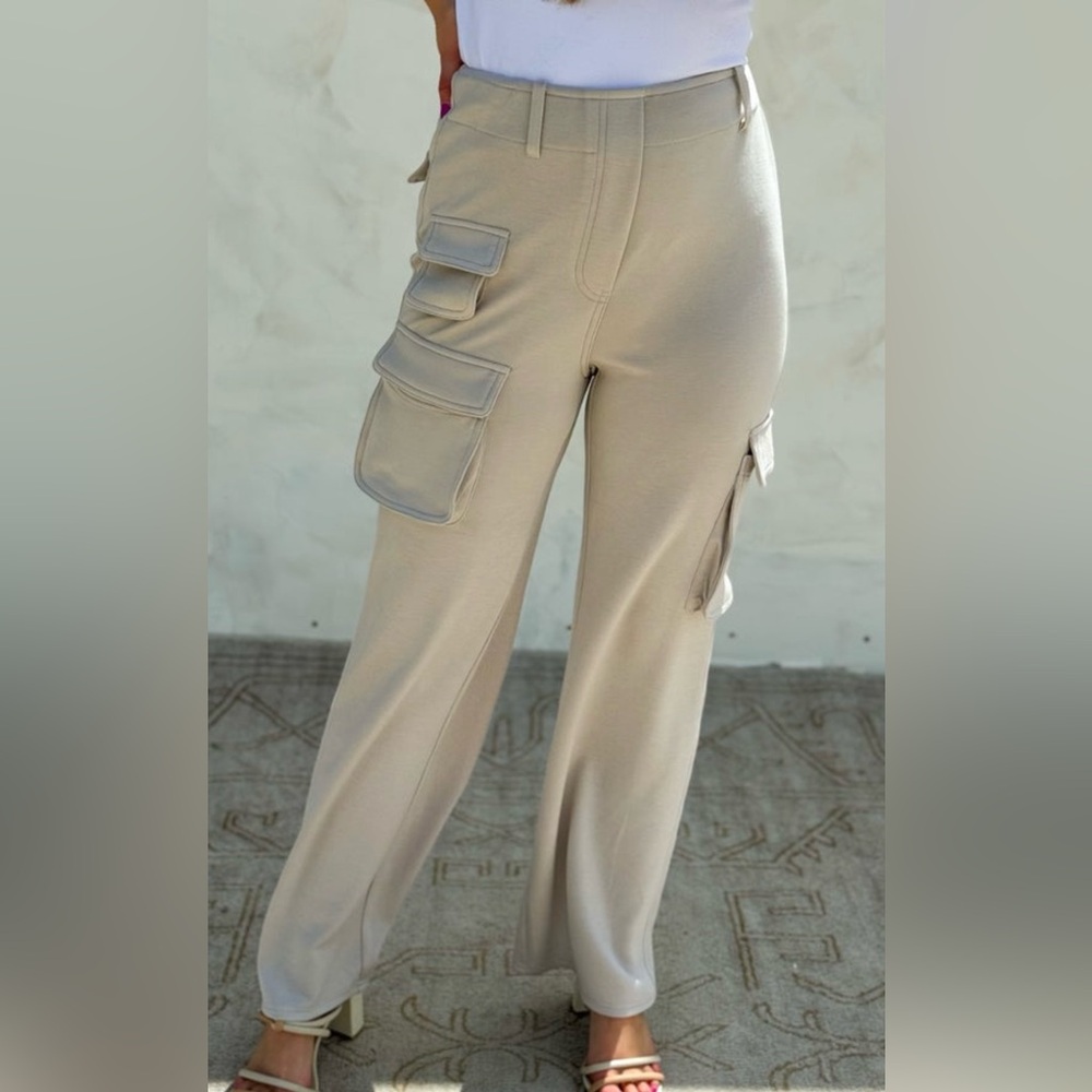 Beige high waisteded cargo pants.